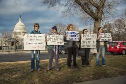 Signs from the Supreme Court rally